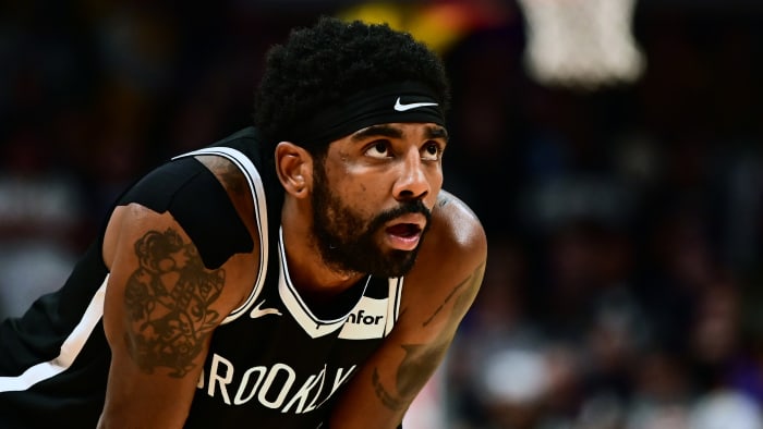 Kyrie Irving posted a message to Instagram after Boston fans heckled him despite his absence.